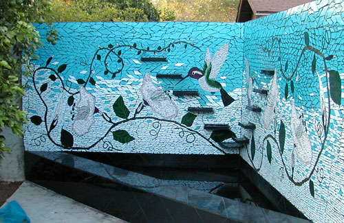 Mosaic fountain wall with hummingbirds